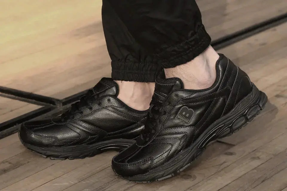 Men's black lace-up running shoes with rugged outsole; pair shown