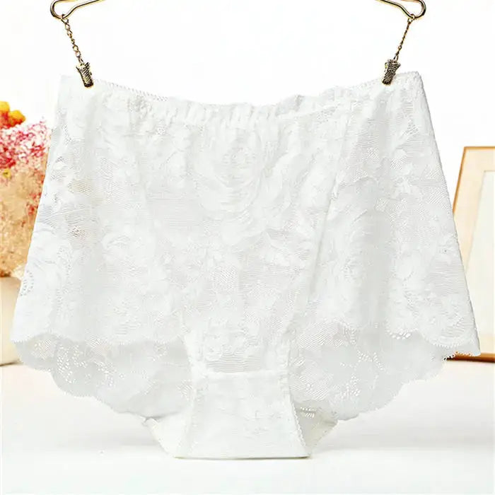White lace high-waist panties displayed on a hanger.