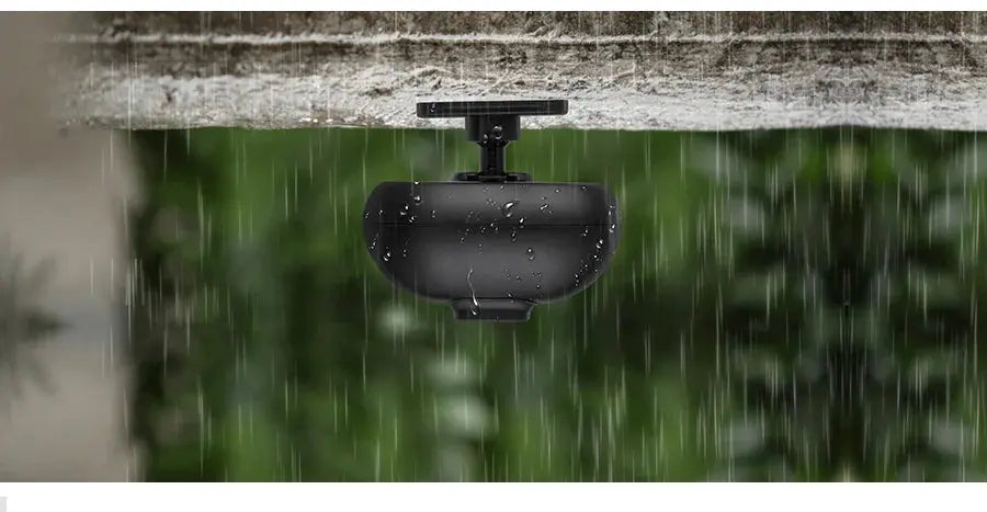 KERUI DW9 outdoor PIR motion detector, black waterproof security sensor mounted under overhang in rain