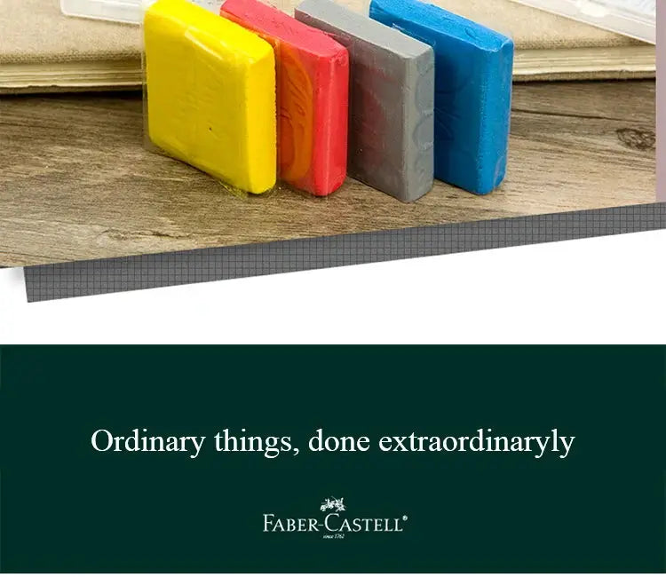 Faber-Castell kneaded erasers, set of 4 in assorted colors on a wooden surface