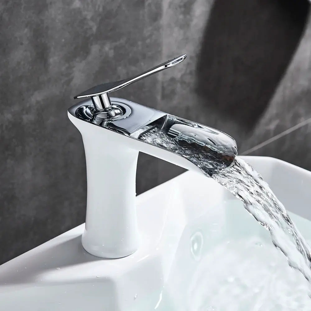 Basin faucet with waterfall flow, single-handle chrome finish by Simples Market for bathroom sink