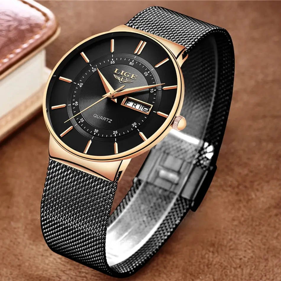 LIGE men's quartz watch with black dial, gold-tone case, date window, and stainless steel mesh strap