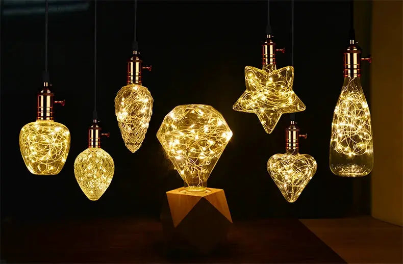 3D night light set of hanging LED bulbs by Simples Market with warm golden glow