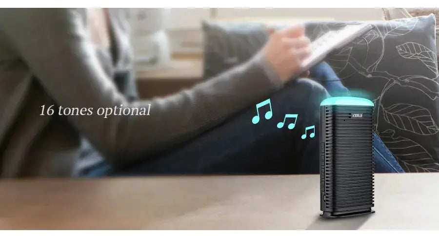 KERUI DW9 wireless driveway alarm unit; black ribbed body with teal top