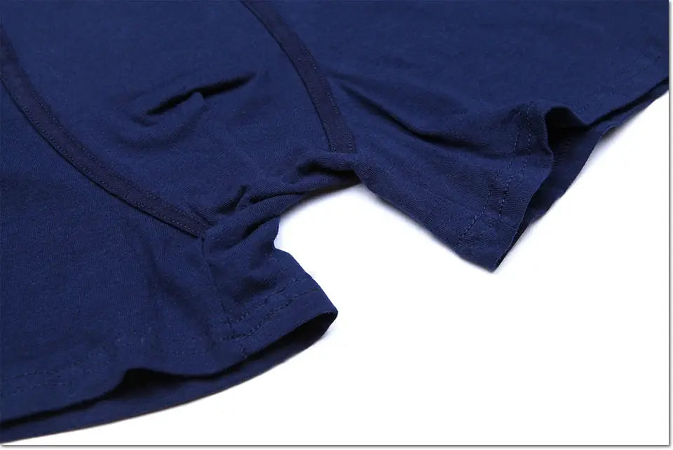 Boxer shorts for men in navy blue cotton, close-up view of stitching; 4-pack set