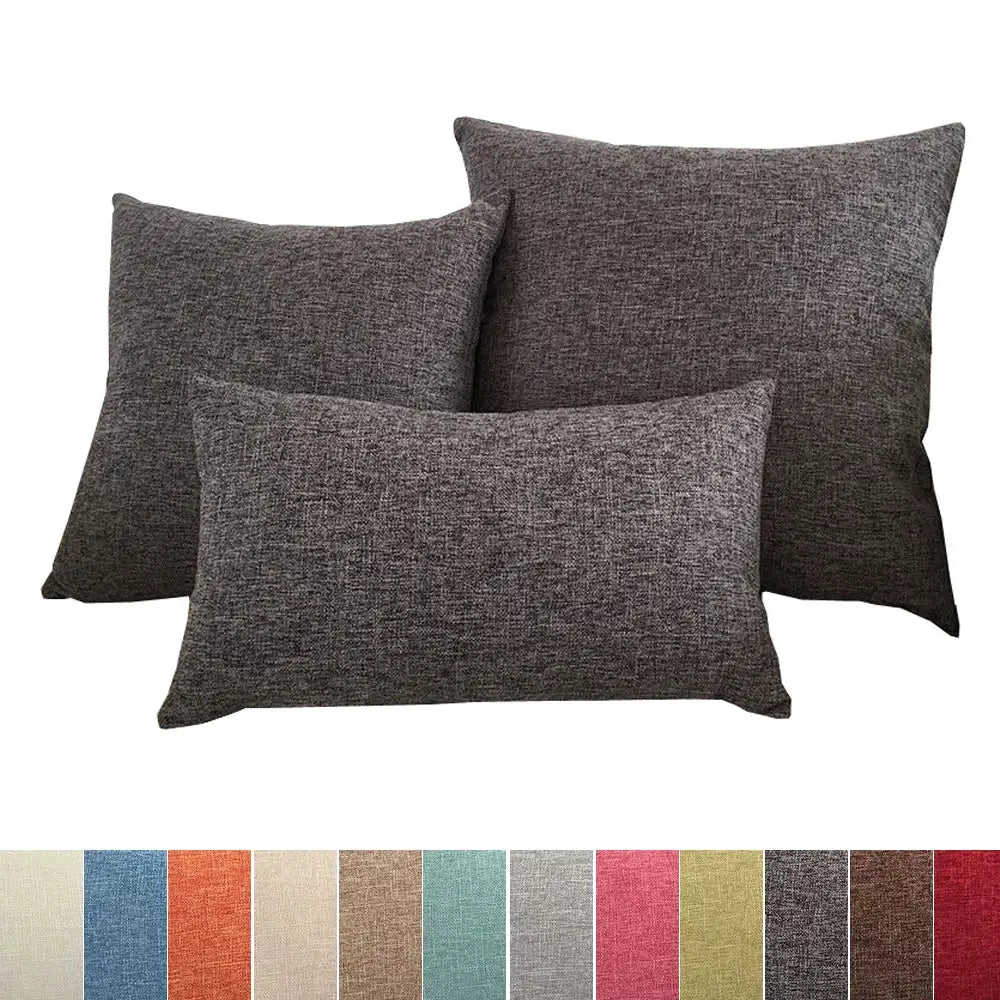 Sofa cushion covers, 3-piece set in dark gray textured fabric; sizes 30x50–60x60 cm.