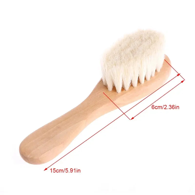 Wooden baby hairbrush with cream-white bristles by Simples Market, 15 cm long