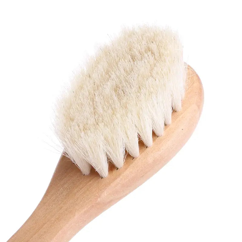 Wooden-handle baby hairbrush with white bristles, Simples Market infant grooming tool