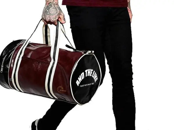 Sport gym bag in burgundy leather-look with white straps and shoe pocket