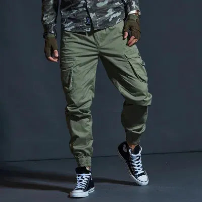 Khaki men's tactical cargo joggers with multiple pockets and cuffed ankles