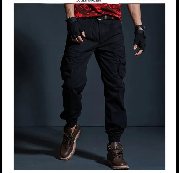 Men's black tactical cargo pants with multiple pockets and jogger cuffs