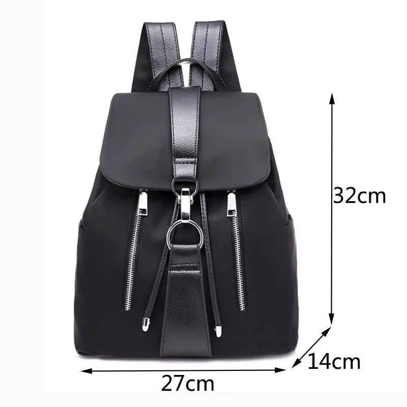 Women's black nylon backpack with silver zippers and ring, front pockets, 27×14×32 cm