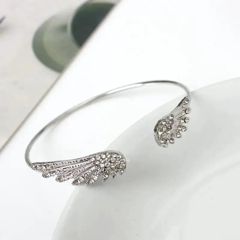 Silver angel wings bracelet for women, adjustable open cuff with crystal accents