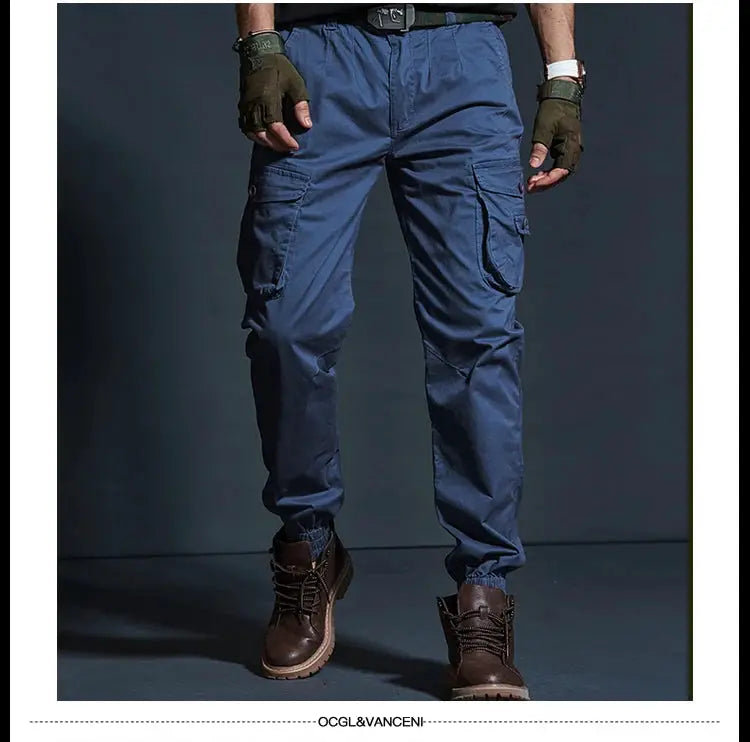 Men's blue cargo jogger pants with multiple pockets and elastic cuffs