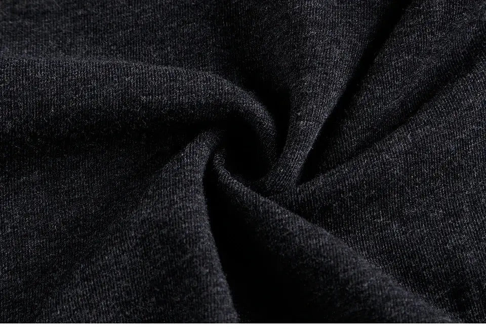 Men's long-leg cotton boxer underwear fabric in dark gray, close-up texture