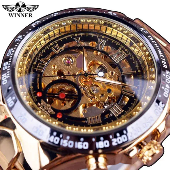 Winner mechanical skeleton watch with gold-tone case and black tachymeter bezel, visible gears