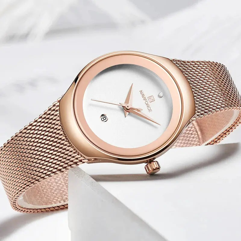 Naviforce rose-gold women's watch with stainless steel mesh band and date window.