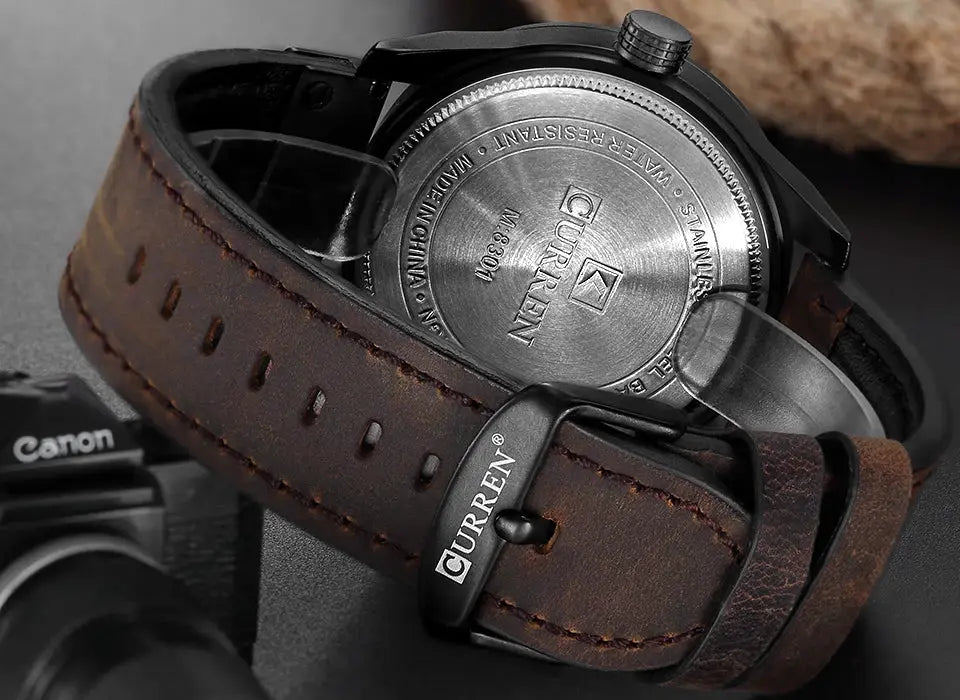 Curren men's quartz watch with brown leather strap and stainless steel back
