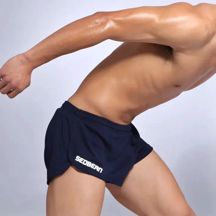 Men's SEOBEAN navy running shorts with white logo, athletic fit, shown on model.