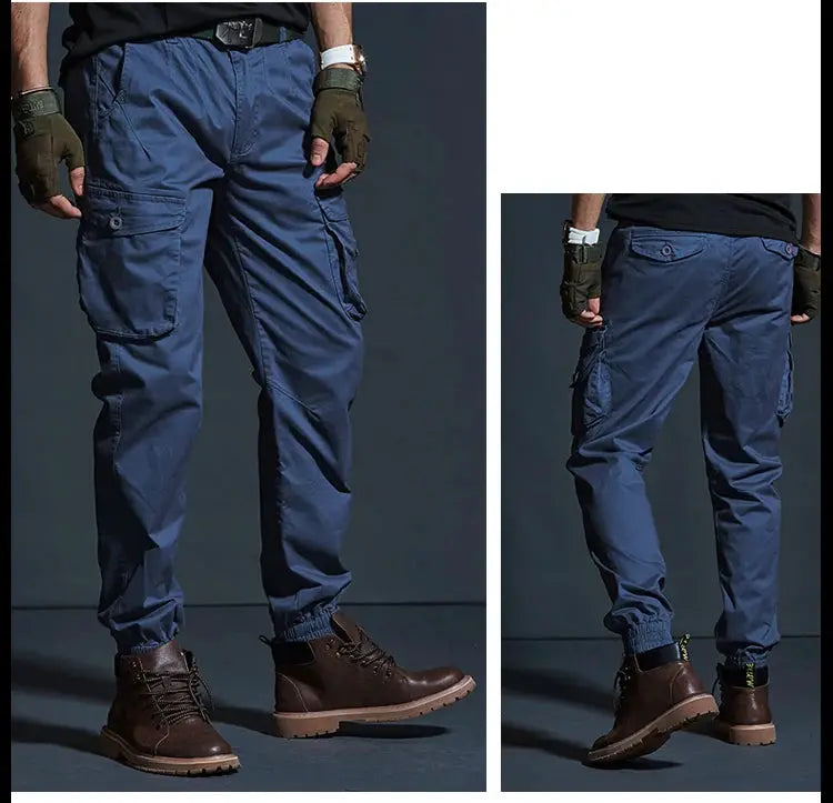 Men's blue tactical cargo pants with multiple pockets and elastic cuffs.