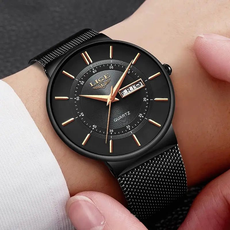 LIGE men's quartz wristwatch with black dial, gold markers, and stainless steel mesh strap.