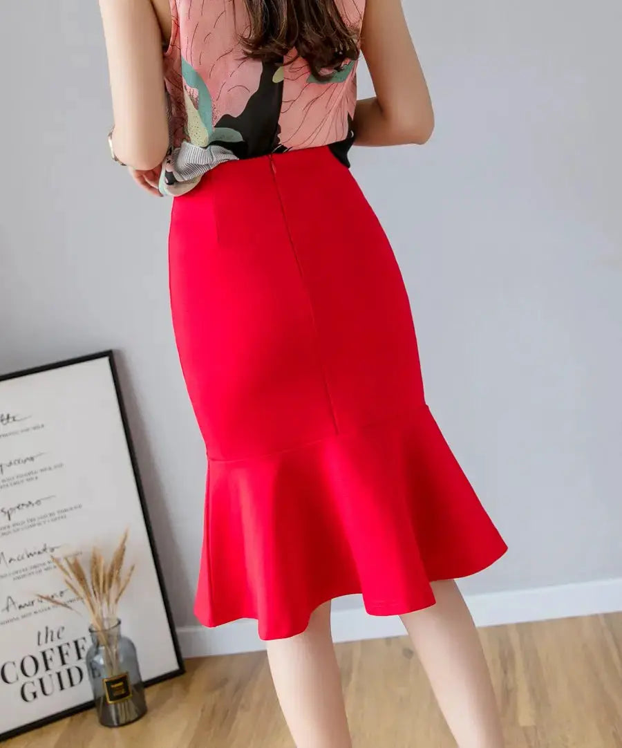 Red high-waisted midi pencil skirt with a ruffled hem