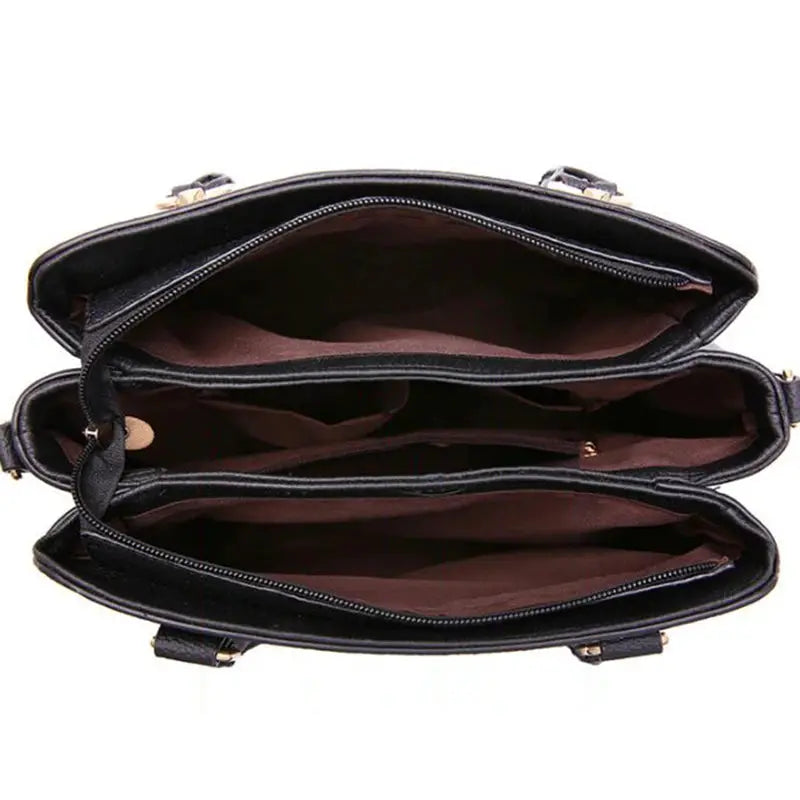 Women's PU leather tote bag with tassel, top-handle design and brown lining with multiple compartments