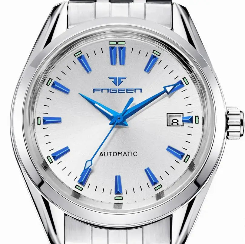 Automatic mechanical wristwatch with blue accents, silver dial, date display, stainless steel band.