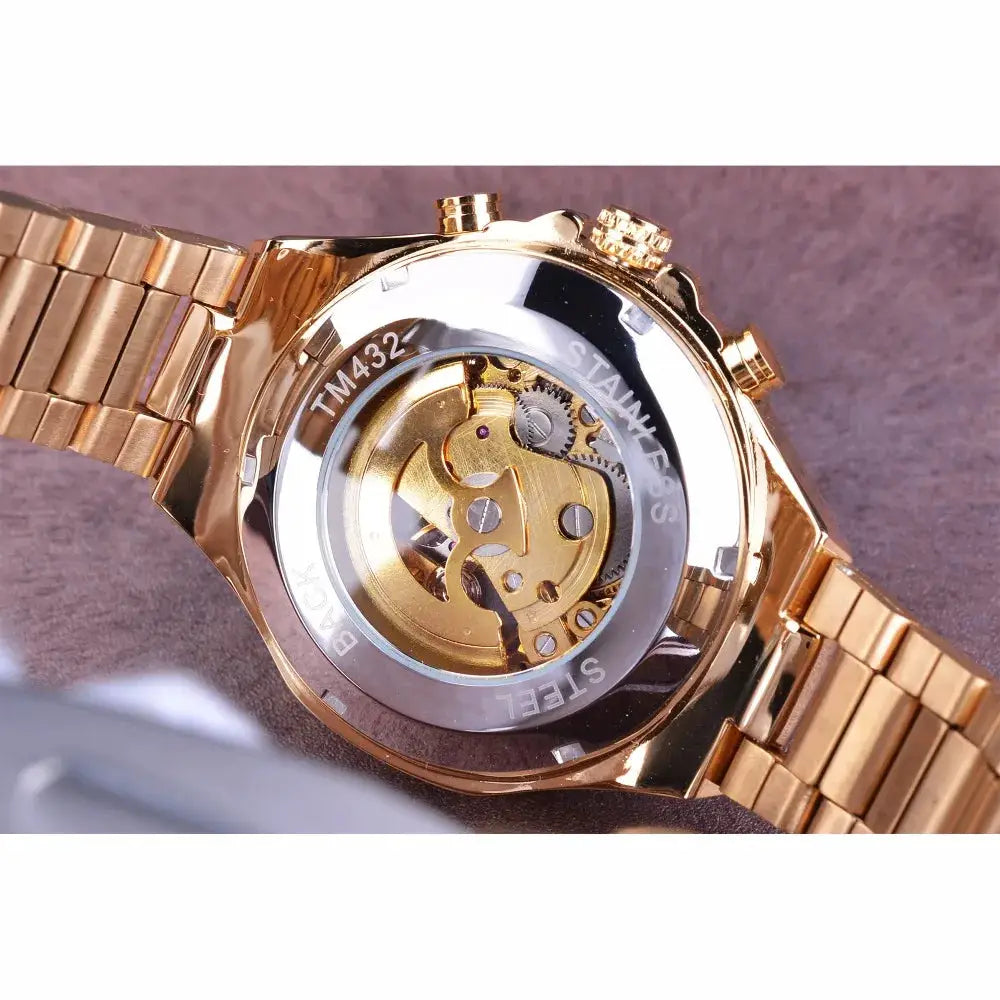 Men's gold-tone stainless steel automatic skeleton watch with transparent case back