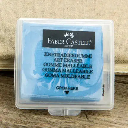 Faber-Castell Plasticity kneaded art eraser in blue, housed in a clear plastic case