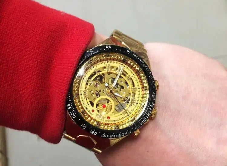 Gold skeleton automatic men's watch with black tachymeter bezel, sport design by Simples Market