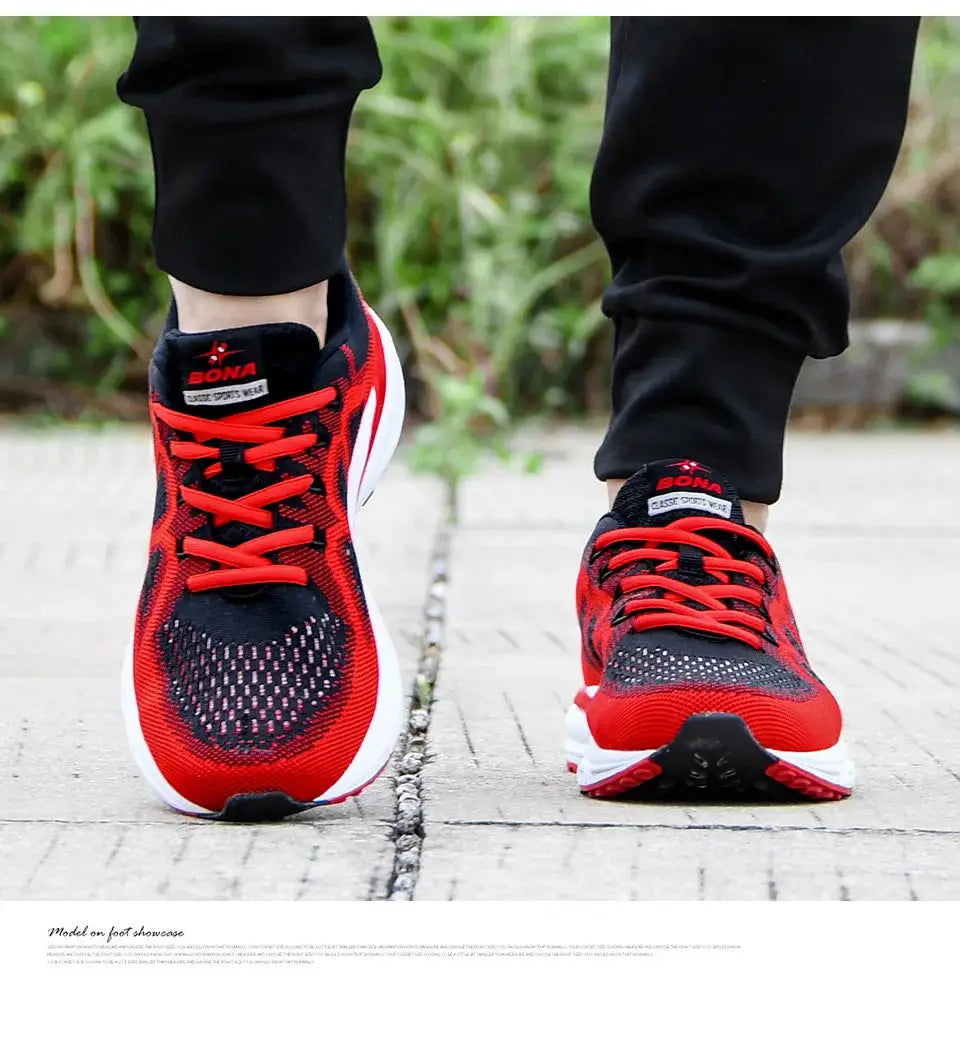 Pair of BONA men's red and black mesh running sneakers.