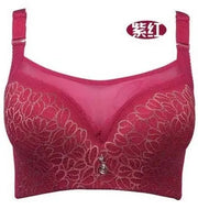 Bra Simples Market red lace push-up bra with floral embroidery and center charm.