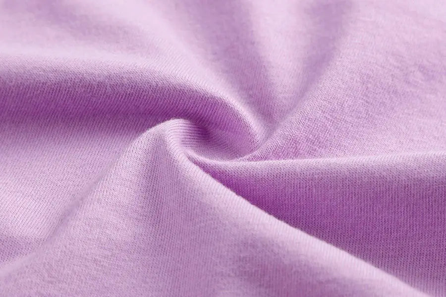 Women's underwear fabric in purple, soft cotton knit close-up