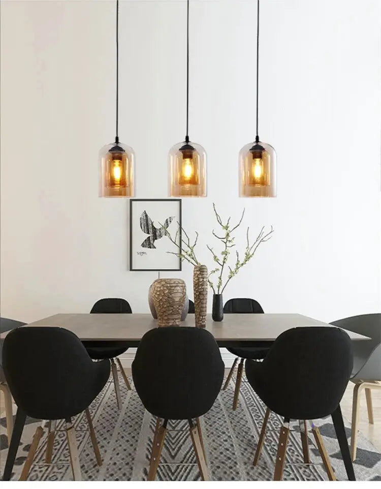 Led pendant lamp Nordic gray glass, trio of hanging lights with black cords over a dining table