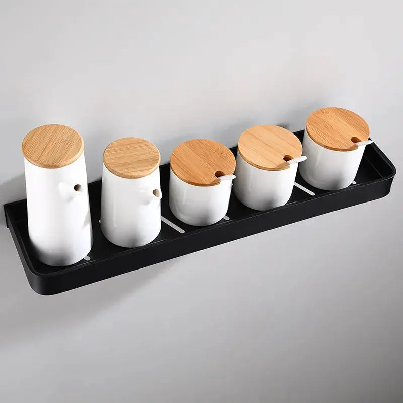 Simples Market bathroom wall-mounted shelf in black aluminum with five white canisters and bamboo lids