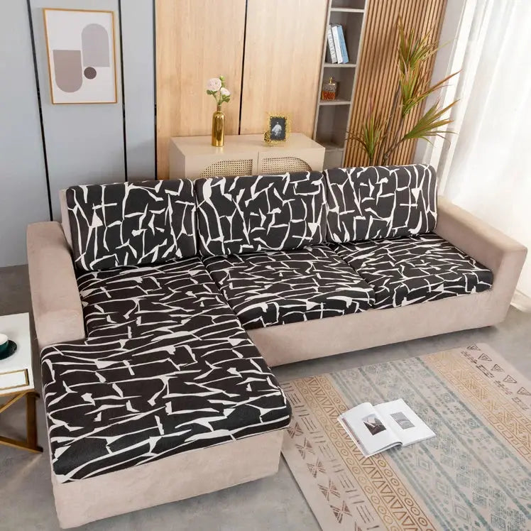 Geometric print sofa cover by Simples Market; elastic stretch corner sectional slipcover in black and white.