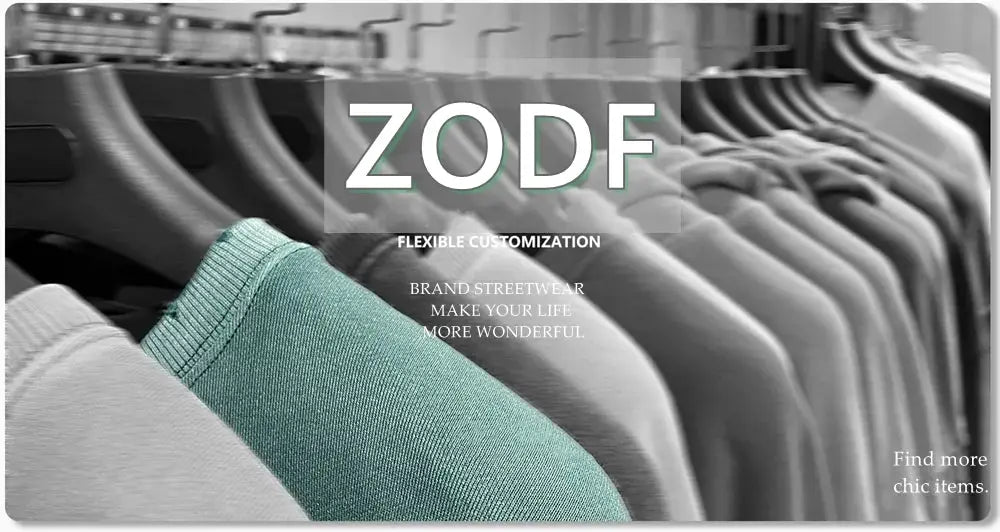 ZODF brand banner on clothing rack, teal foreground garment with grayscale shirts in back