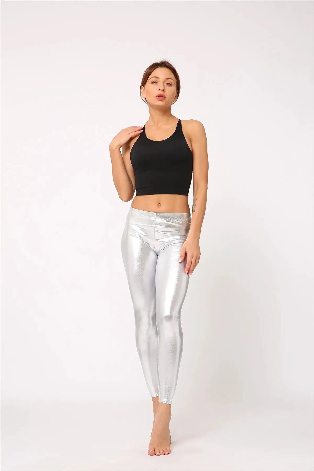 Ladies silver metallic laser leather leggings with a shiny finish