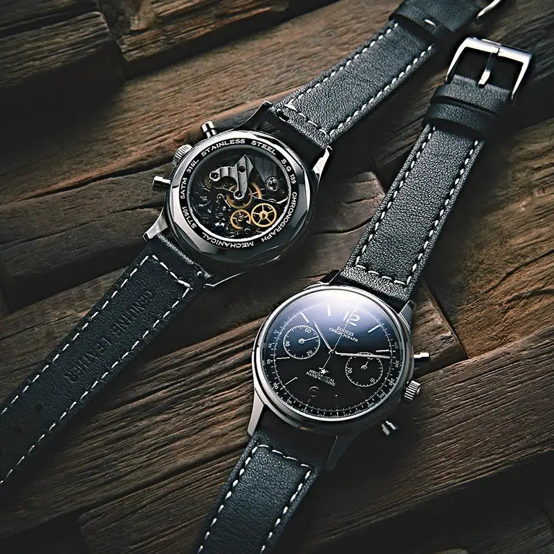 Two Sugess 1963 Pilot Panda chronograph watches with black dials and leather straps.
