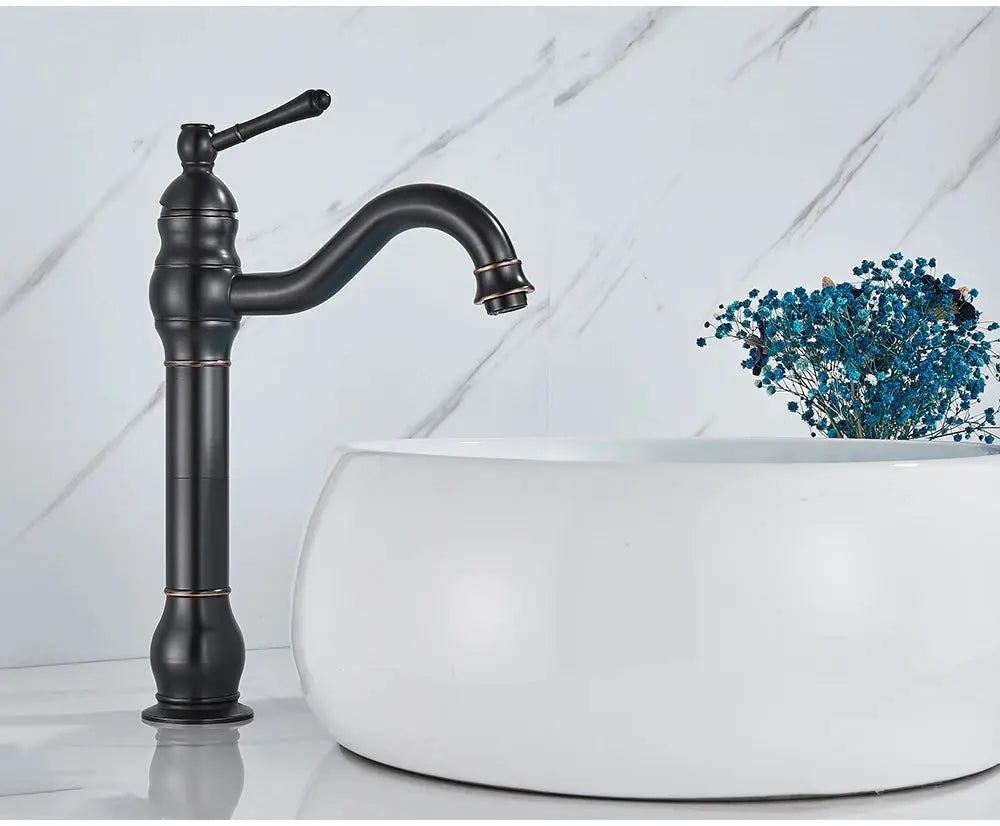 Antique brass vessel sink faucet, deck-mounted single-hole mixer for hot and cold water.