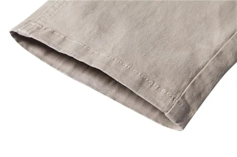 Men's cotton trousers in beige, Simples Market casual slim-fit pant hem close-up