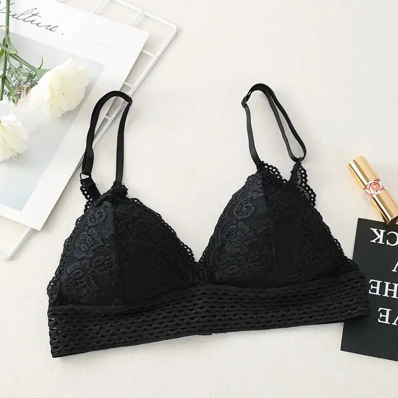 Black floral lace bralette with adjustable straps, triangle cups, and crocheted band.