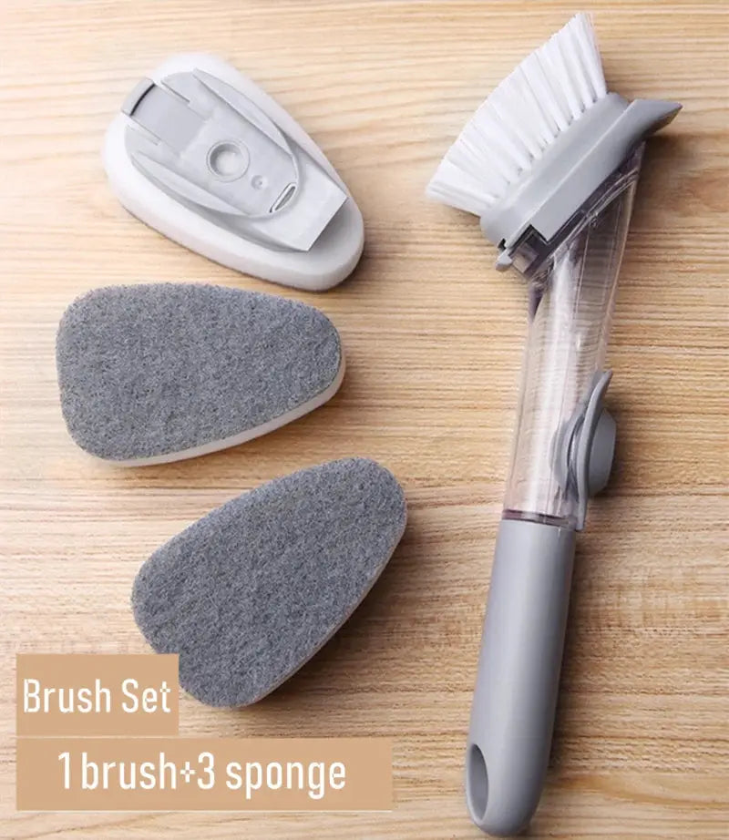 Refillable liquid kitchen cleaning brush with long gray handle and clear reservoir, plus 3 gray sponges