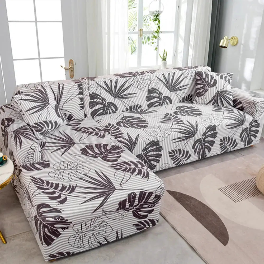 Sofa cover for L-shaped sofa; stretch printed slipcover in white with dark brown palm leaf pattern, Simples Market