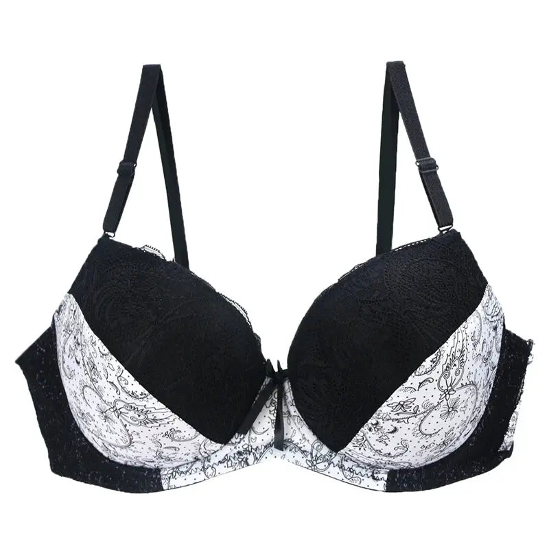 Simples Market lace push-up bra, black cups with white patterned band, adjustable straps.