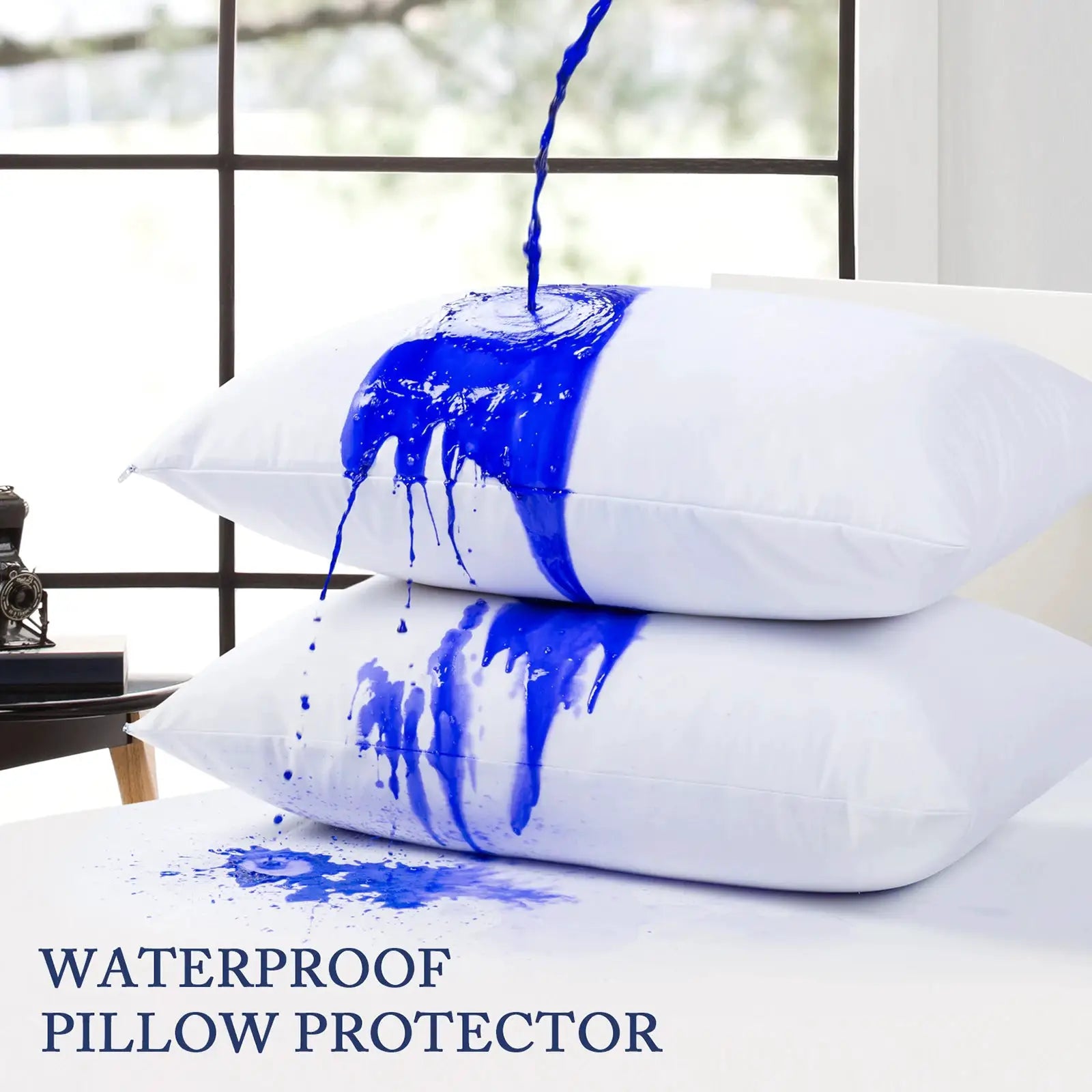 Simples Market waterproof pillow protector; two white pillow covers with blue paint streaks