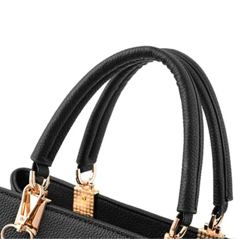 Shoulder bag by Simples Market, black leather with gold-tone hardware