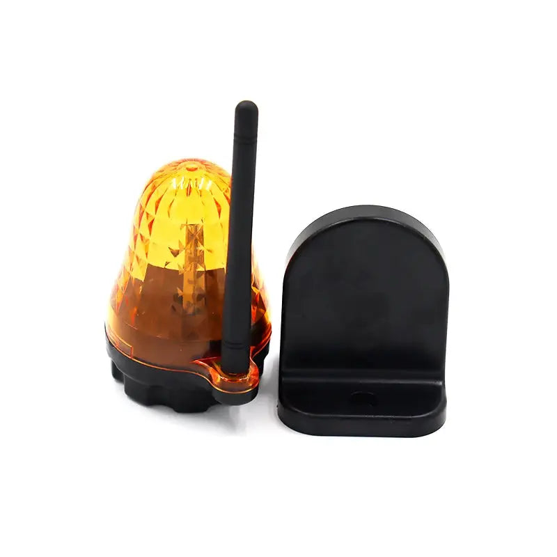 Two-piece outdoor orange LED signal beacon with wall-mount base and antenna, universal 12V/24V/220V.