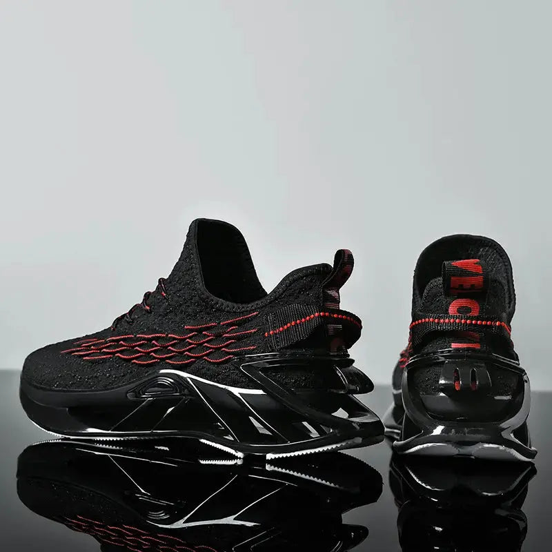 Pair of men's black knit sneakers with red stitching and a glossy heel cage.